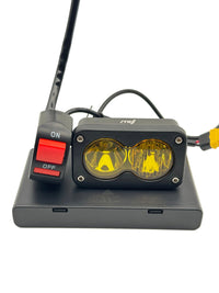ZYNX Universal Baja Light with yellow lens, battery box and handlebar on/off switch