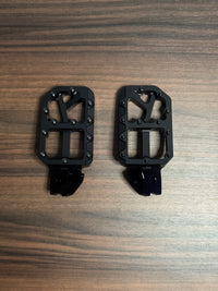 Black foot pegs